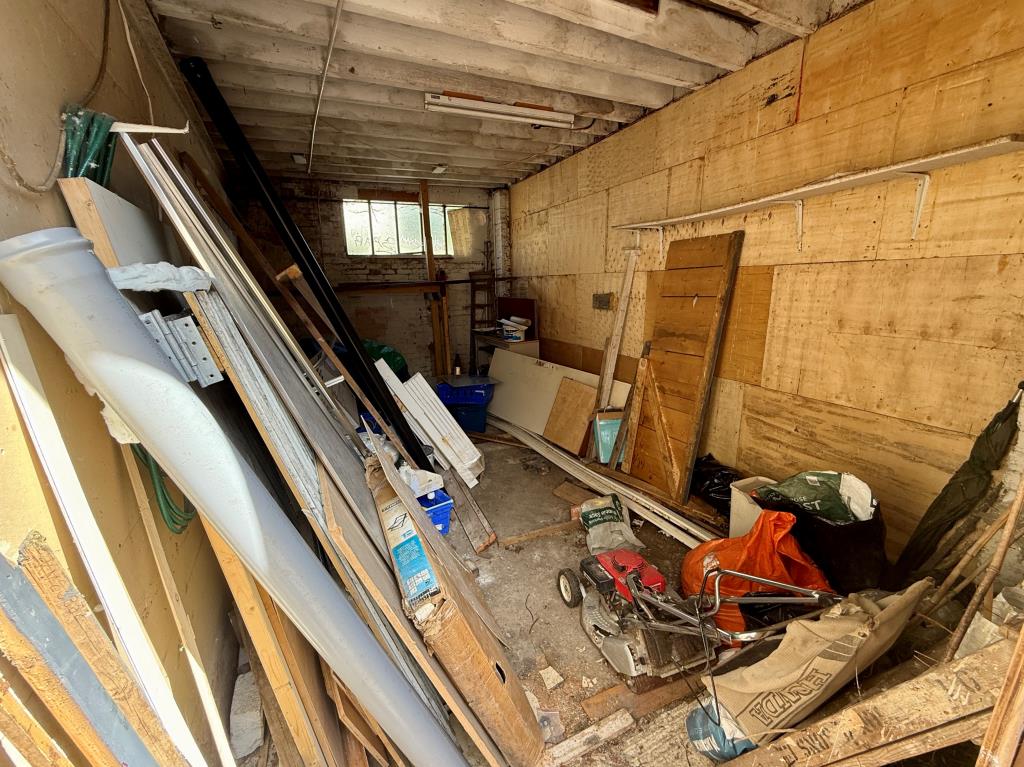 Lot: 162 - TOWN CENTRE BUILDERS YARD/WORKSHOPS WITH PLANNING FOR REDEVELOPMENT - Lock-up garage